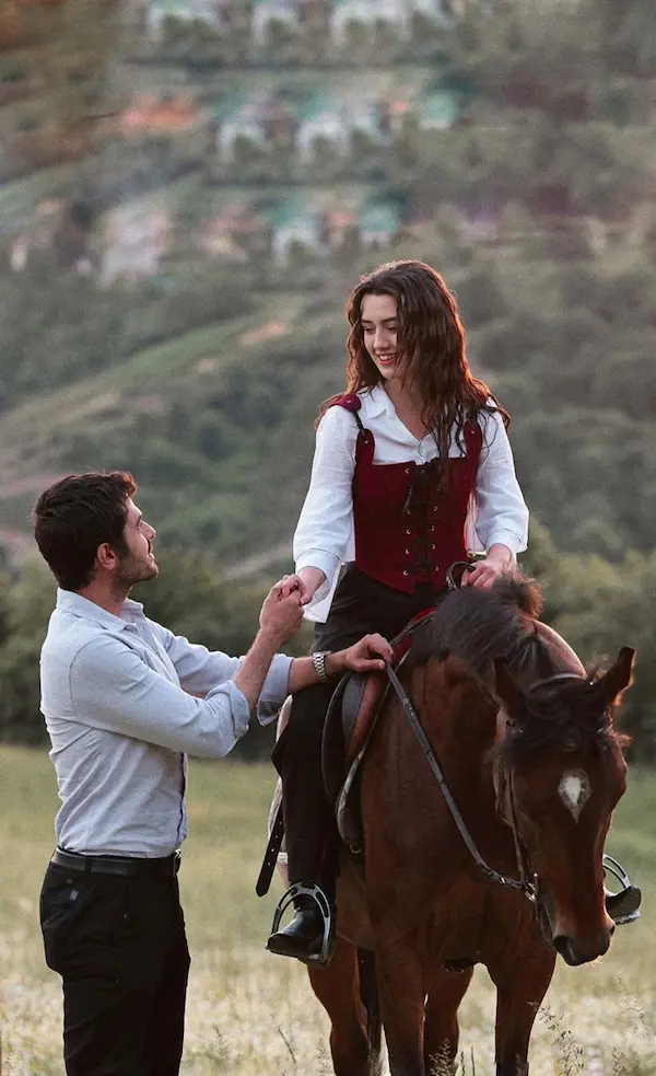 Romantic horseback moment