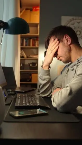 Stressed man at desk